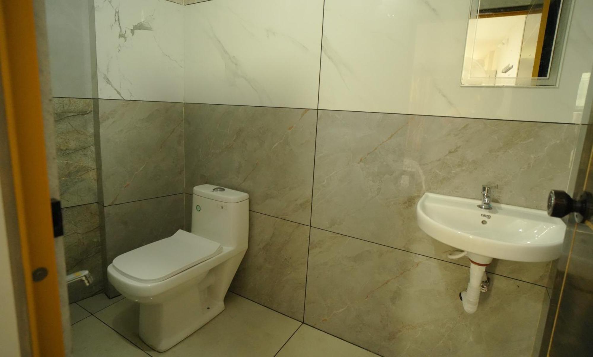 מלון נדומבסרי Port View Residency Pvr מראה חיצוני תמונה